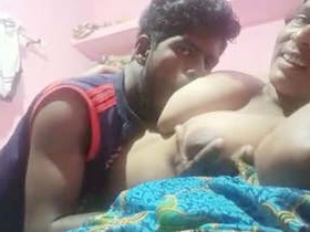 Watch a Bhabi in Love in Boob Sucking and Romance Clips