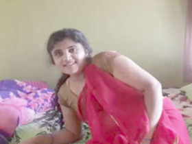 Indian wife with black hair indulges in solo play and films her husband's reaction