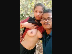 A couple from the village enjoys outdoor boob sucking in the sunshine