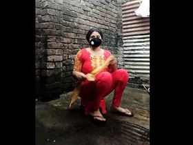 A beautiful Bangladeshi Akha girl in a sexy dress gets naked and showers in this steamy video
