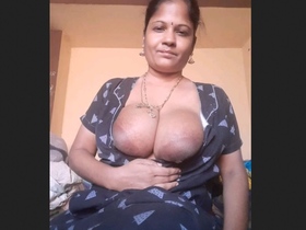 MILF with big boobs gives a hot blowjob in amateur video