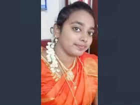 Tamil babe displays her big tits and pussy in a sizzling video